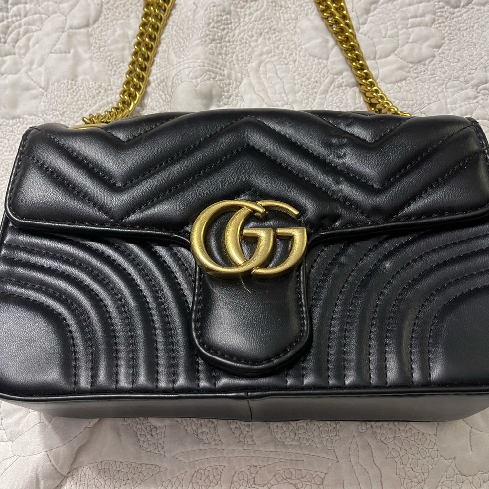 Black handbag with chain strap